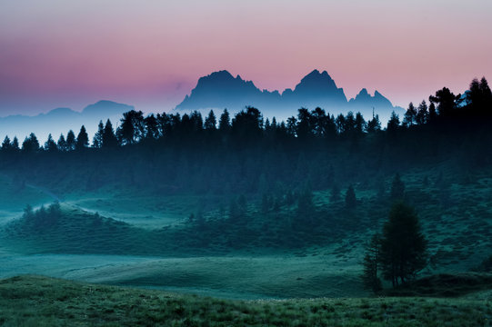 The dawn paints the sky above the Creton of Clap Grande mount in Carnia, Sauris, Friuli Venezia Giulia, Italy, Europe