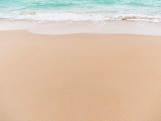 Fototapeta na wymiar Beach top view.beach sand and blue sea in thailand. summer holiday travel concept.