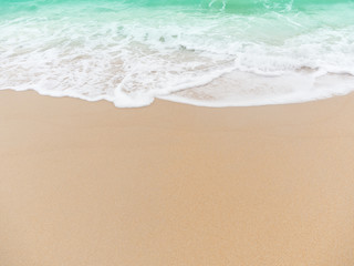 Obraz na płótnie Canvas Beach top view.beach sand and blue sea in thailand. summer holiday travel concept.