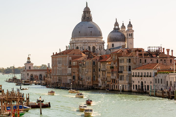 The Grand Canal of Venice, boats and handballs go along the canal.