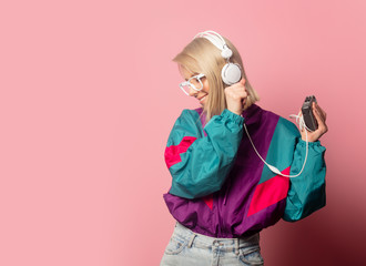 woman in 90s clothes with headphones