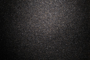 background of black crushed anthracite grain with copy space for your text