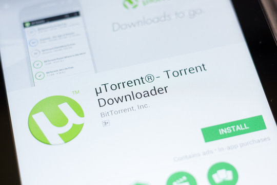 Ryazan, Russia - June 24, 2018: Utorrent Torrent Downloader mobile app on the display of tablet PC.