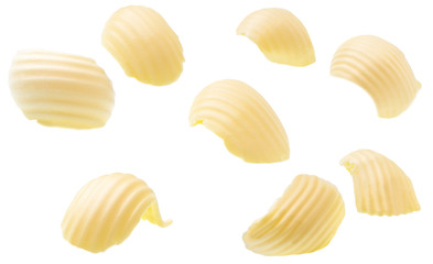 different butter curls or rolls isolated on white background. Clipping paths