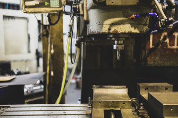 Fatory manual milling machine in metalworking manufactory business, © unzenzer