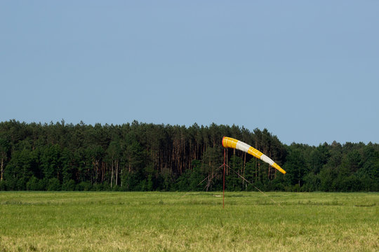 The device measures the direction of the wind in aviation.