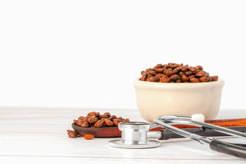 Stethoscope with coffee beans : Healthy food concept.