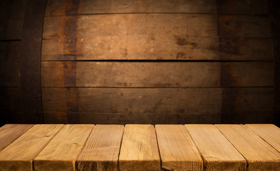 Empty brown wooden table and blur background of abstract of resturant lights people enjoy eating ,can be used for montage or display your products