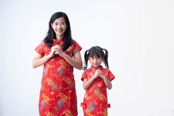 Obraz premium happy chinese new year. asian girl with Congratulation gesture