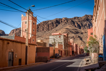 Orange houses with canyons in the background, Tinghir, Morocco