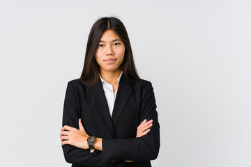 Young asian business woman who feels confident, crossing arms with determination.
