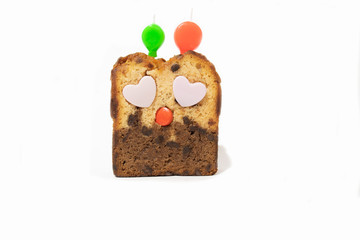 cake slice with smiley sad face worried about taste isolated on white background