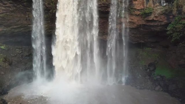 Translation:Phu Cuong waterfall A flying camera captures a waterfall in Vietnam
