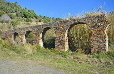 Fototapeta na wymiar Roman aqueduct of Can Cua in Pineda de Mar Barcelona Spain