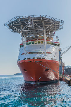 Ocean Bottom Seismic Vessel. Geographical surveying and mapping vessel with helipad on its bow. Stock Image.