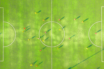 Aerial view of soccer field or football field with motion of prayer in match. top view