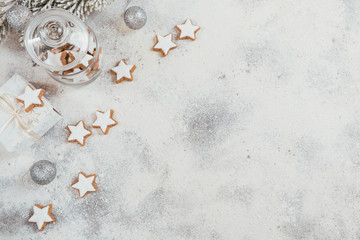 Star shape cookies and Christmas decorations on white background