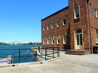 View of Sydney Harbour Bridge from Cockatoo Island © Chawapong