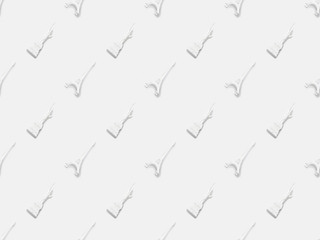 top view of eiffel tower statuettes and small statue of liberty isolated on white