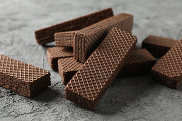 Sweet wafers on grey background, close up
