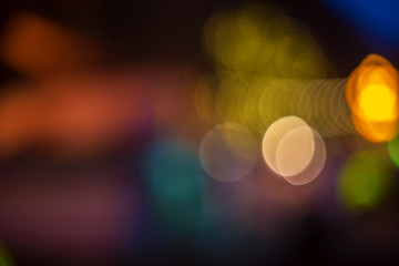 Multicolored bokeh effect background with city lights. Abstract background.