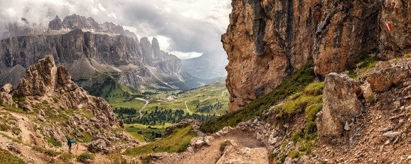 Hiking in the Cir Peaks with view to Sella Group in the background, Dolomite Alps in South Tyrol, Italy