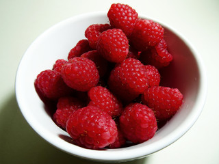 Raspberries in a small bowl