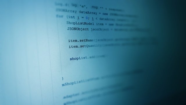Abstract computer script code. Programming code screen of software developer. Software Programming Work Time.