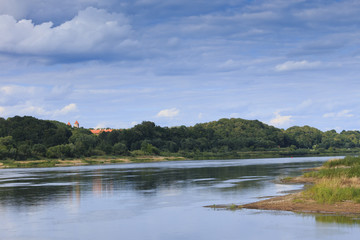 Fototapeta na wymiar Landscape with Penemunes castle near river Nemuna.