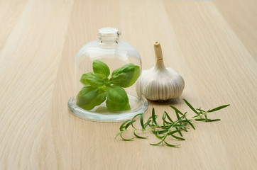 Homegrown tomatoes and garlic on the wooden background