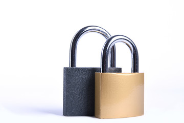 Two Locked grey and golden Padlock on the white background.