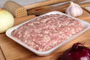 Ground chicken in polystyrene food tray