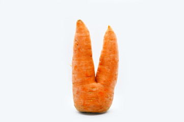 Ugly carrots.Funny, unnormal vegetable or food waste concept. Unformatted vegetables.