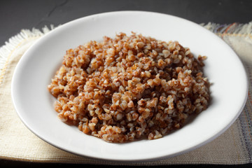 buckwheat porridge on a white plate