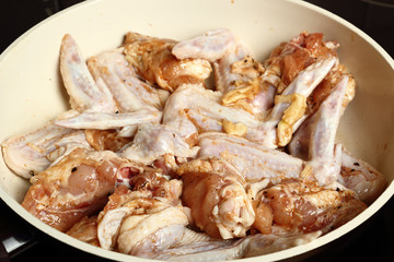 Frying chicken wings