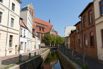 Fototapeta na wymiar Muehlengrube River with St. Nicholas Church, Wismar, Mecklenburg-Western Pomerania, Germany