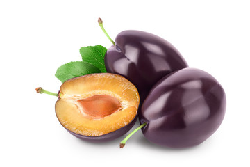 fresh purple plum and half with leaves isolated on white background with clipping path and full...