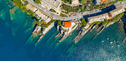 Rocky bay in Italy. Aerial drone view on Adriatic sea beach, Camogli, liguria.
