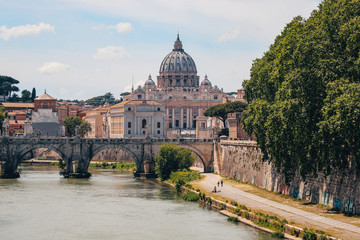 Fototapeta premium St. Peter's Basilica, St. angel bridge over the Tiber river, view of the Vatican. Rome, Italy, May 2019.