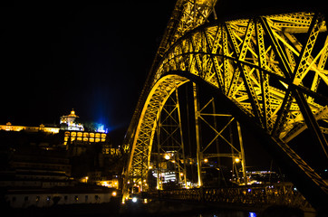 Portugal, night Porto, lights of night city, night panoramic view of The Eiffel Bridge, Ponte Dom Luis,  Bridge Ponti Di Don Luis,  Douro river, Eiffel bridge arch night landscape
