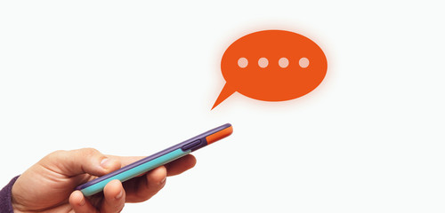 Hand of man typing text on mobile smartphone. Online chat chatting on application communication...
