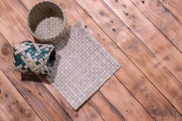 baskets and mat from leave freeze on the wooden table