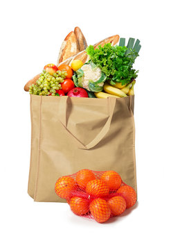 Eco Friendly Reusable Shopping Bag Filled With Bread, Fruits And Vegetables On A White Background Tangerines In Grid Beside