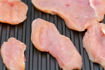 grilled raw meat before cooking