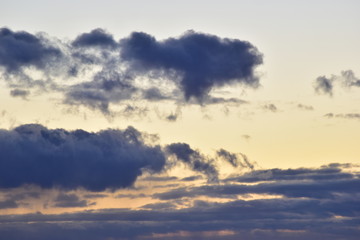 winter snow clouds at sunset