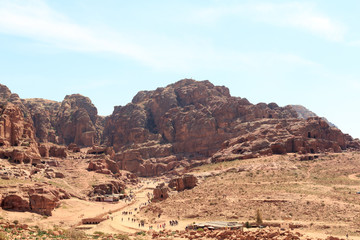 Fototapeta na wymiar Panorama of ancient city of Petra with street of facades, amphitheatre and caves in Jordan