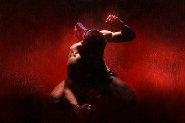 Thai boxer in the rain and under a red spotlight. Mongkhon. The concept of tournaments, Thai boxing...