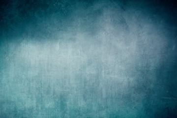 Obraz na płótnie Canvas blue grungy backdrop with spotlight
