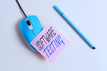 Writing note showing Software Testing. Business concept for evaluate the functionality of a...