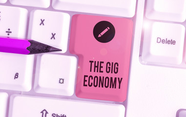Conceptual hand writing showing The Gig Economy. Concept meaning Market of Shortterm contracts...